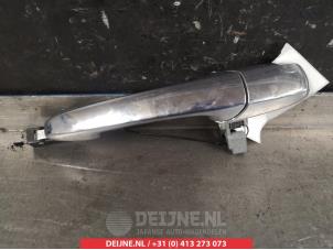 Gebruikte Portiergreep 4Deurs rechts-achter Mazda CX-7 2.2 MZR-CD 16V AWD Prijs € 25,00 Margeregeling aangeboden door V.Deijne Jap.Auto-onderdelen BV