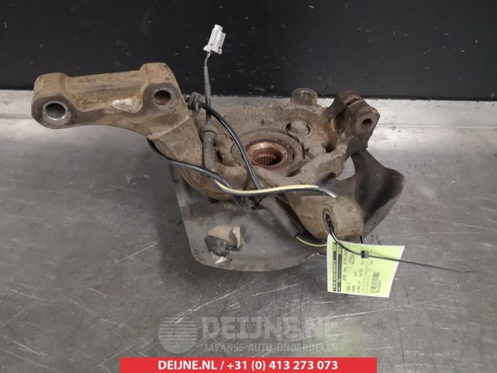 Nissan X-Trail Fusee links-voor O322547