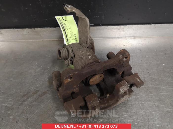Nissan Primera Bremszange rechts hinten O376911