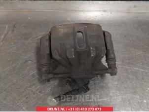 Toyota Corolla Bremszange links vorne O325603 foto 2