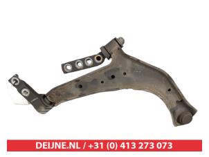 Nissan Almera Tino Draagarm onder links-voor O381219 foto 2