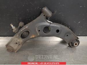 Subaru Justy Front lower wishbone, right O382271 photo 2