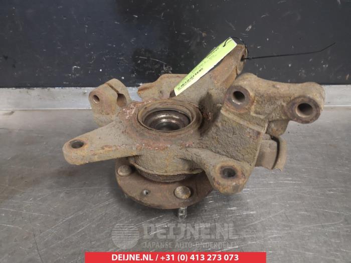 Kia Carens Fusee links-voor O322635