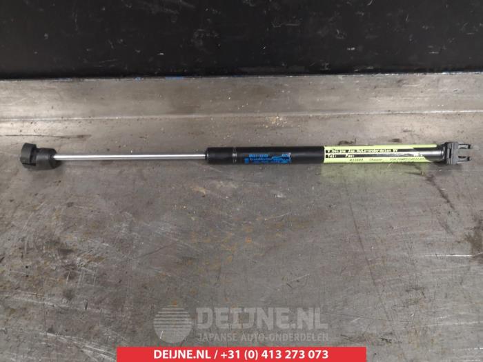 Nissan Pathfinder Gasdemper links-achter O293844