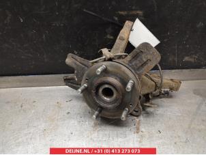 Kia Carens Achsschenkel rechts vorne O323650 foto 2