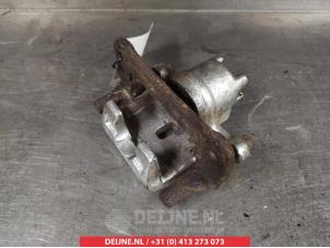 Mitsubishi Pajero Remklauw (Tang) links-achter O376439 foto 2