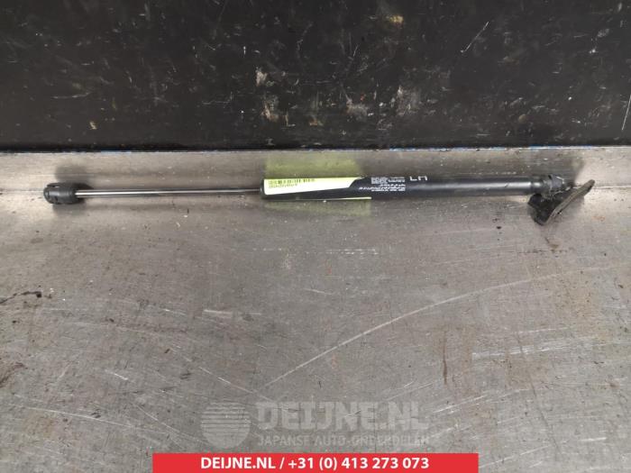 Kia Sportage Gasdemper links-achter O293990