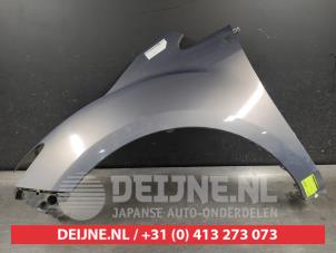 Gebruikte Spatbord links-voor Mazda CX-7 2.3 MZR DISI Turbo 16V AWD Prijs € 75,00 Margeregeling aangeboden door V.Deijne Jap.Auto-onderdelen BV