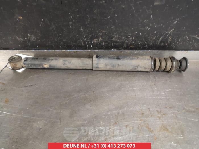 Nissan Note Schokdemper links-achter O378416