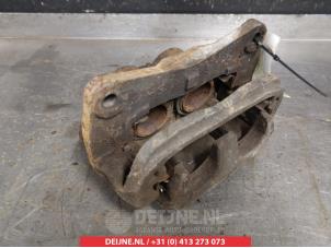 Subaru Legacy Bremszange links vorne O324993 foto 2