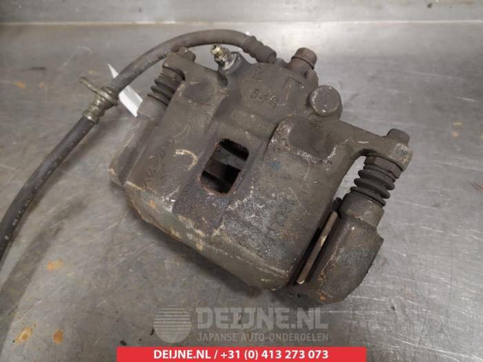 Suzuki Liana Remklauw (Tang) rechts-voor O326759