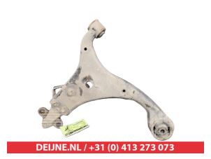 Kia Carens Querlenker unten links vorne O381377 foto 2