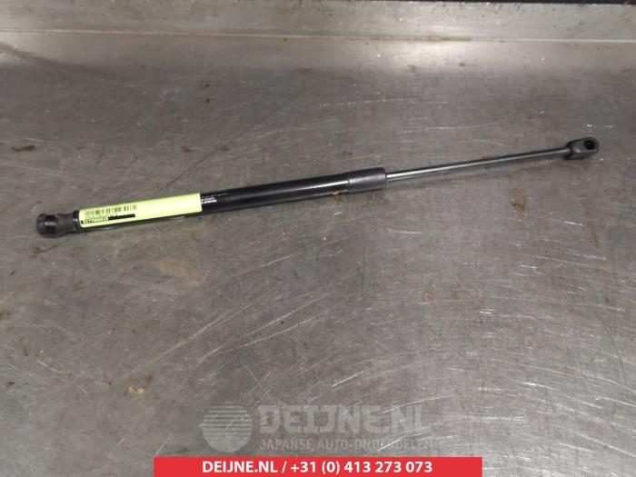Kia Rio Gasdemper links-achter O294014