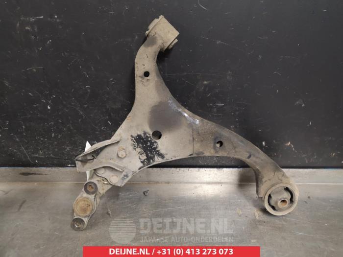 Kia Carens Draagarm onder rechts-voor O382367