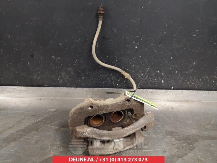 Nissan X-Trail Remklauw (Tang) links-voor O324896