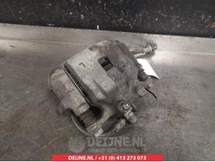 Suzuki Swift Front brake calliper, left O325541 photo 2