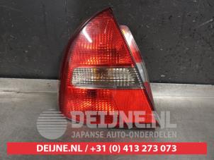 Mitsubishi Carisma Rücklicht links O298167 foto 2