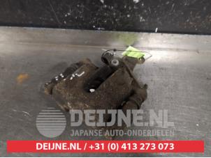 Mitsubishi Space Star Bremszange links hinten O394042 foto 2