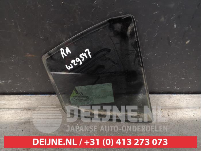 Mazda 3 Driehoeks Ruit rechts-achter O394572