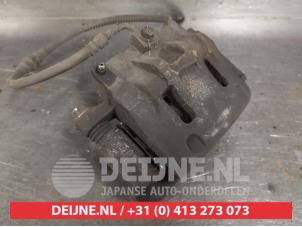 Kia Carnival Bremszange rechts vorne O394735 foto 2