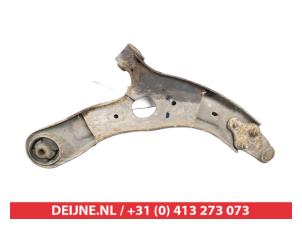 Kia Carens Querlenker unten links vorne O395243 foto 2