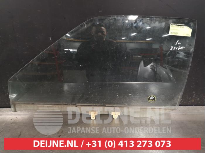 Nissan King Cab Türscheibe 4-türig links vorne O396056