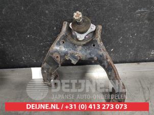 Mitsubishi L200 Front upper wishbone, right O396265 photo 2