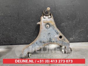 Mitsubishi L200 Front lower wishbone, left O396266 photo 2