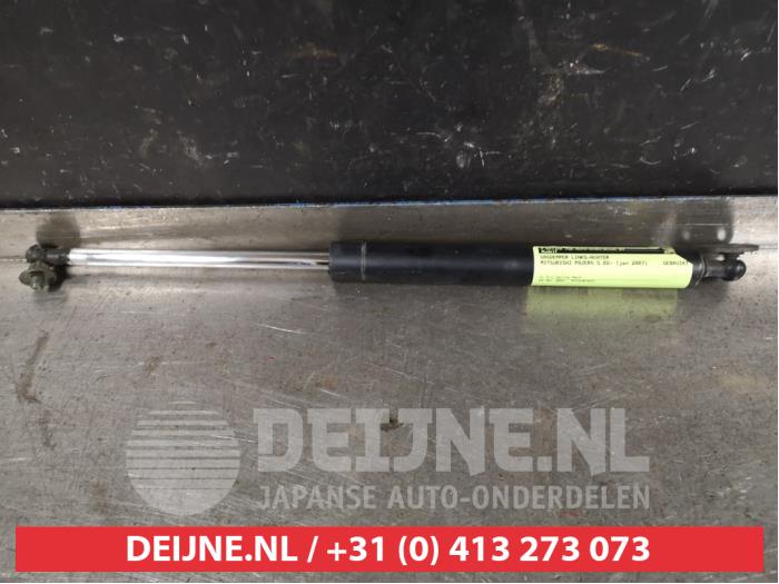 Mitsubishi Pajero Gasdemper links-achter O396510