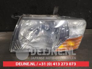 Mitsubishi Pajero Scheinwerfer links O397146 foto 2
