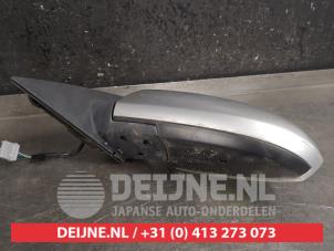 Nissan Primera Buitenspiegel links O397923 foto 3