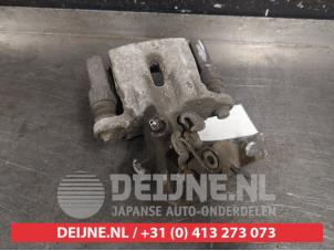 Suzuki Baleno Bremszange links hinten O398486 foto 2
