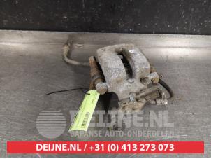 Toyota Avensis Rear brake calliper, left O400099 photo 2