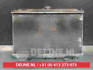 Nissan Almera Tino Kühler O400909 foto 2