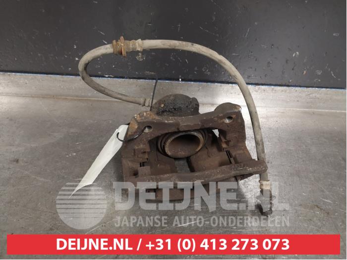 Nissan Micra Remklauw (Tang) links-voor O402018