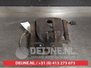 Nissan Micra Bremszange links vorne O402018 foto 2