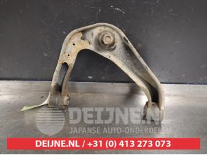 Nissan Navara Front upper wishbone, left O403358 photo 2