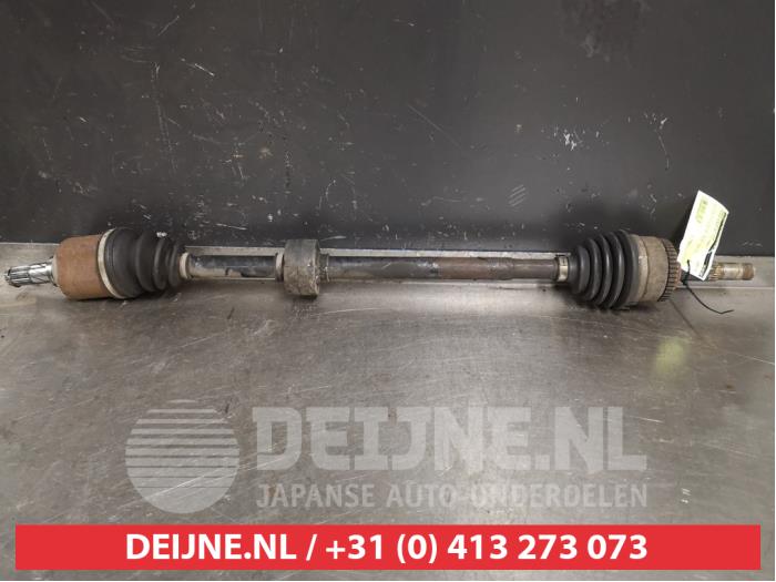 Nissan Almera Aandrijfas rechts-voor O403555