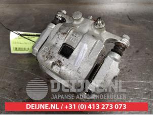 Suzuki Swift Front brake calliper, left O404269 photo 2