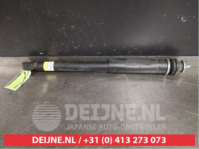 Suzuki Swift Schokdemper links-achter O404275