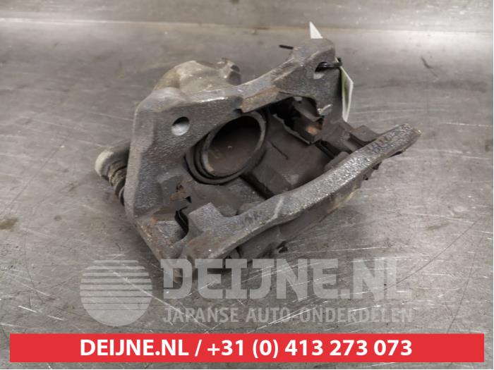 Nissan Micra Remklauw (Tang) links-voor O404465