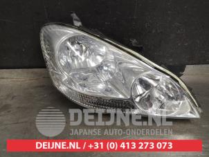 Toyota Avensis Verso Scheinwerfer rechts O404955 foto 2