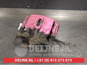 Toyota Corolla Bremszange links vorne O405006 foto 2