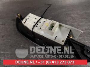 Toyota Yaris Multi-functional window switch O407433 photo 2