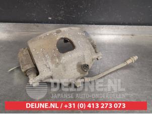 Kia Cerato Bremszange rechts vorne O407783 foto 2