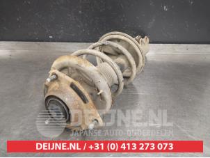 Kia Cerato Schokdemperpoot rechts-voor O407787 foto 2