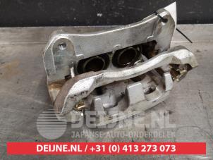 Toyota Rav-4 Bremszange links vorne O410235 foto 2