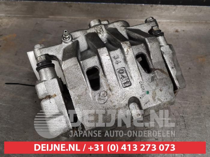 Toyota Rav-4 Bremszange rechts vorne O410236