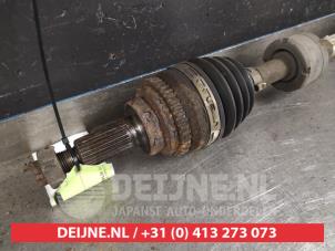 Suzuki Ignis Aandrijfas rechts-voor O410702 foto 2