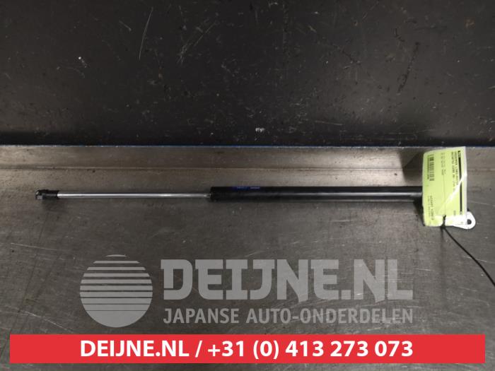 Daihatsu Cuore Gasdemper links-achter O411046